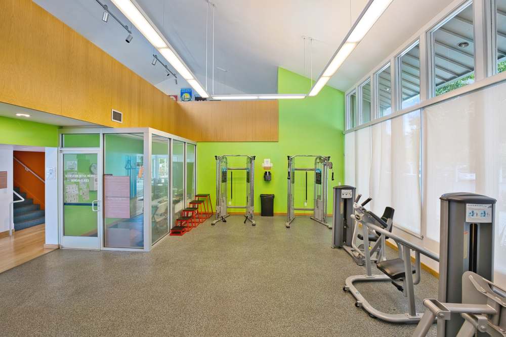 Gym with fitness equipment at Lakeside Village in San Leandro, California
