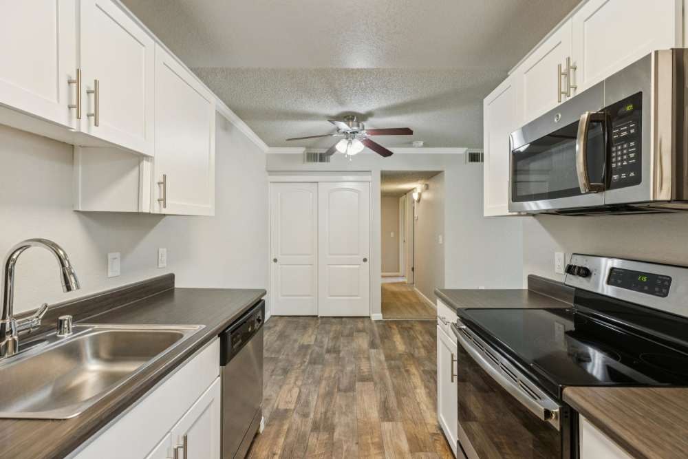 Beautiful, gourmet kitchen in a model home at Plum Tree Apartment Homes in Martinez, California