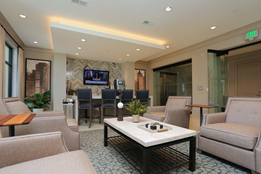 Lounge room with kitchen at 2370 Main at Sugarloaf in Duluth, Georgia