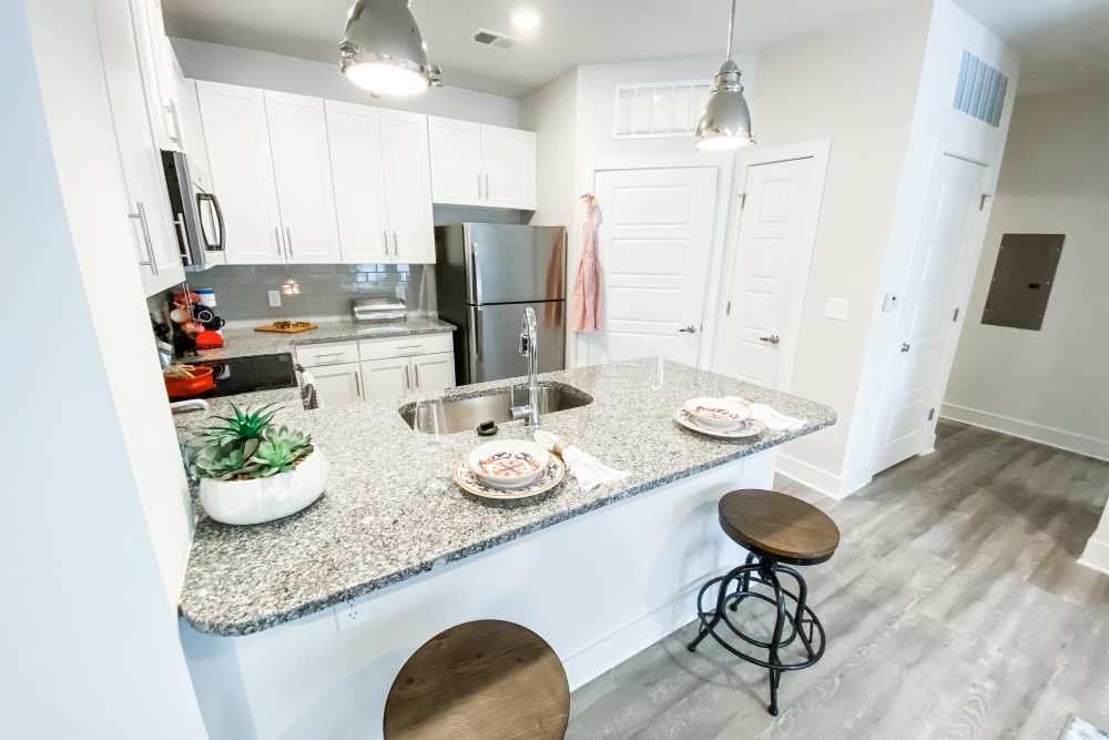 Kitchen with extended breakfast counter at South City Apartments in Summerville, South Carolina