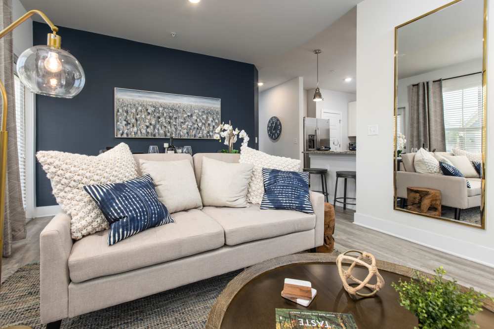 Living room with sofa and coffee table at South City Apartments in Summerville, South Carolina 