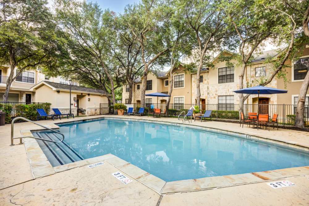 Outdoor swimming pool at The Quarry Townhomes in San Antonio, Texas