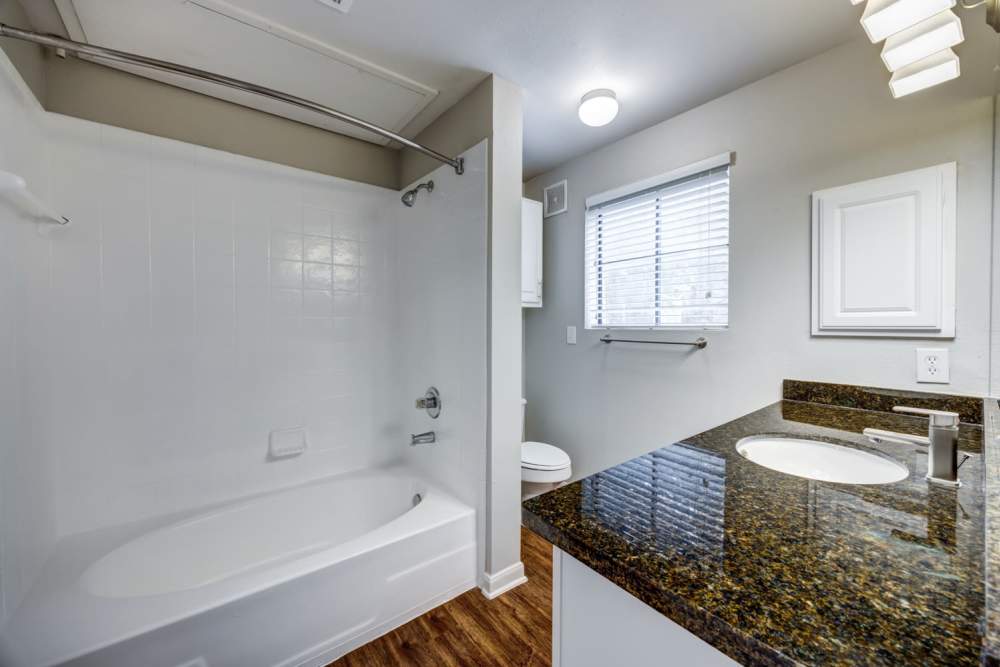 Bathrooms with a tub at The Quarry Townhomes in San Antonio, Texas