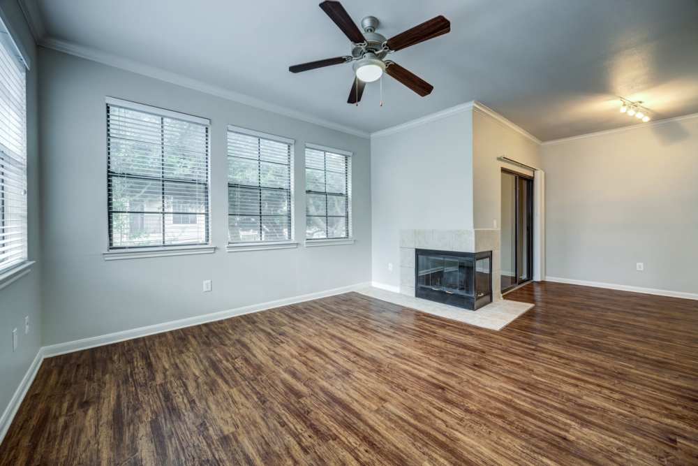 Floor plan with ceiling fans and large windows at The Quarry Townhomes in San Antonio, Texas
