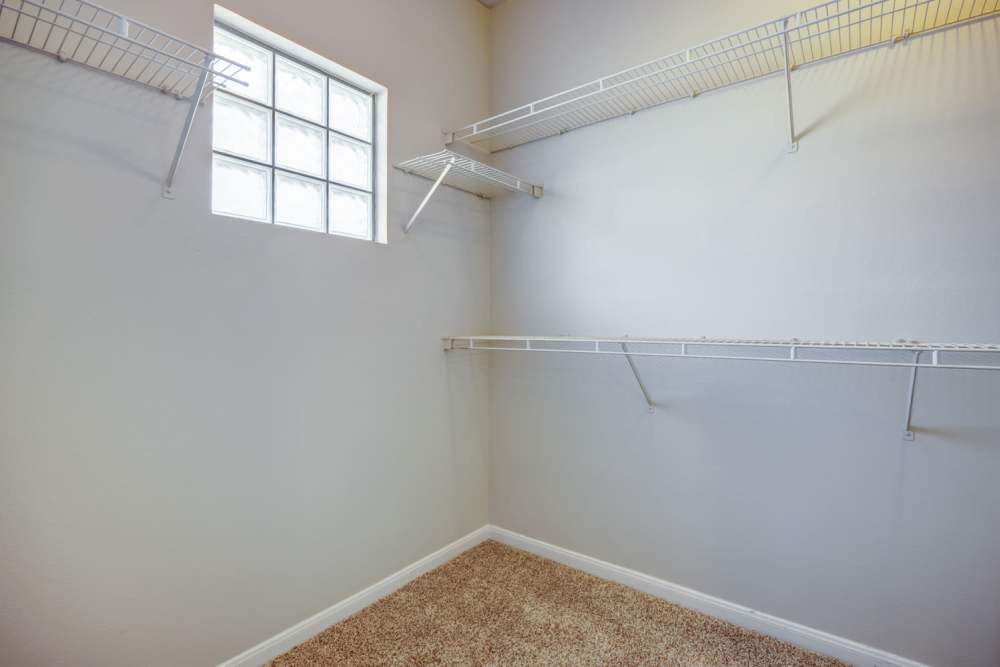 Spacious closet and dresser spaces at The Quarry Townhomes in San Antonio, Texas