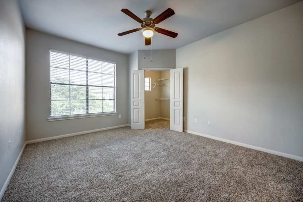 Apartments with carpet floorings at The Quarry Townhomes in San Antonio, Texas