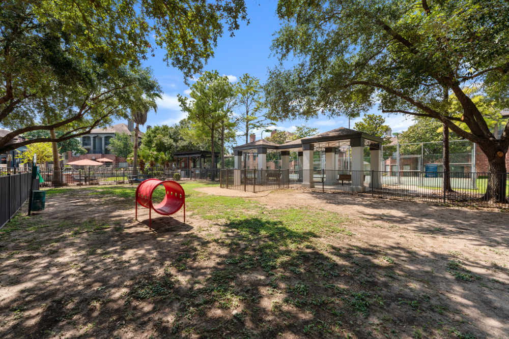 Dog park with trees at Barnett in Houston, Texas