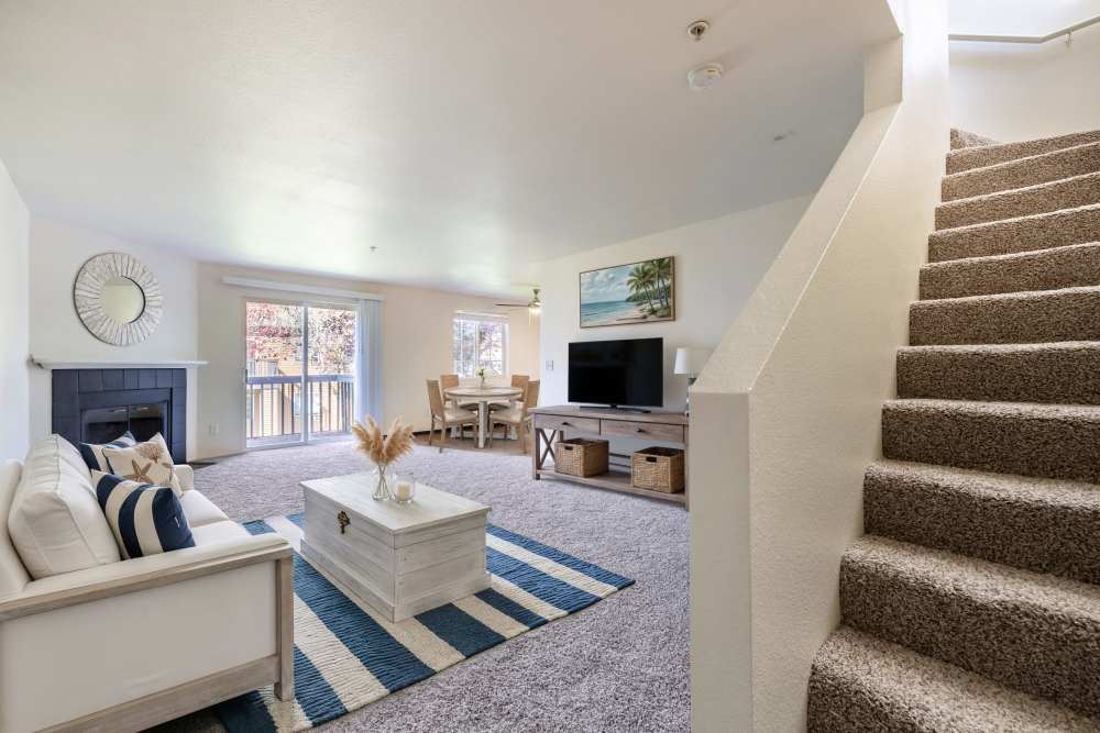 Spacious living room stairway up to second floor at Renaissance at 29th Apartments in Vancouver, Washington