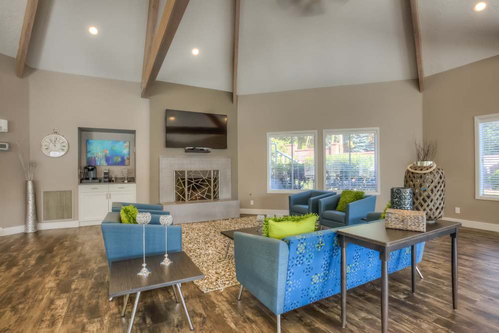 Living area with a television at Oak Hill Apartments in Portland, Oregon
