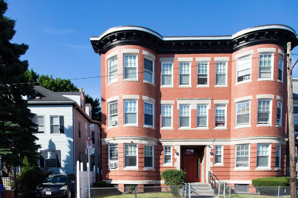 Apartment building exterior at JPNDC Pitts Portfolio in Roxbury, Massachusetts