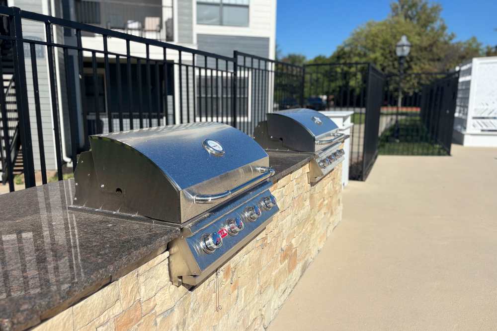 Outdoor grilling stations at The Landing Lawrence 