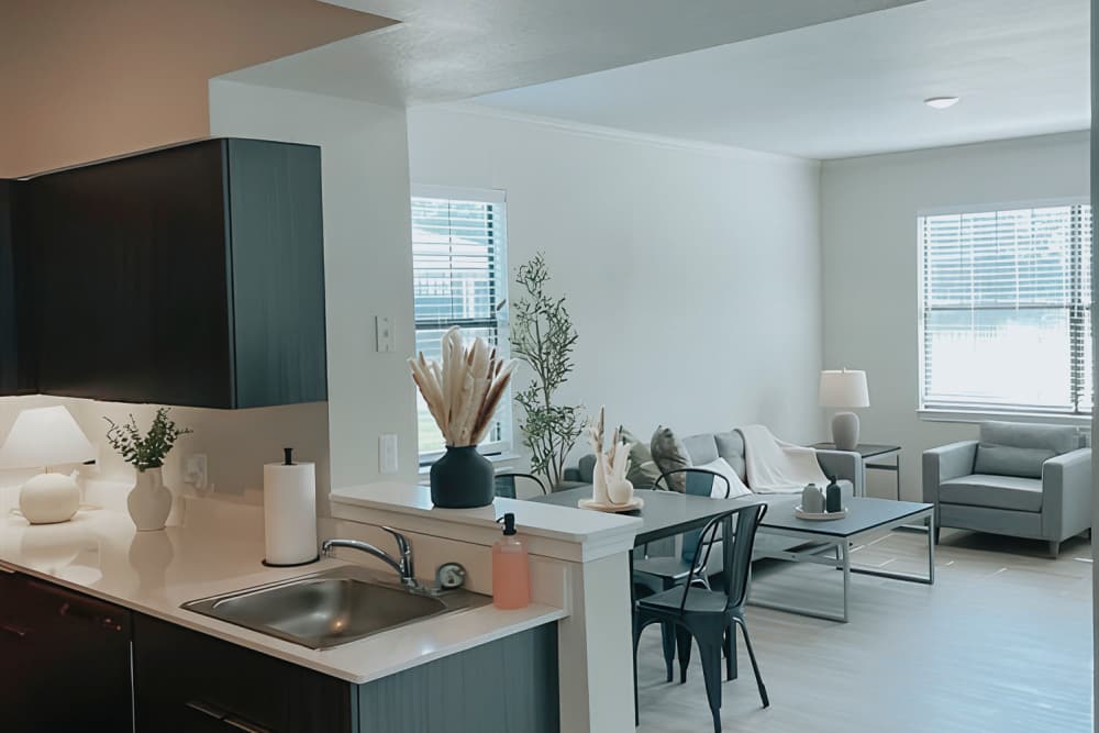 Renovated unit kitchen and dining area at The Landing Lawrence 