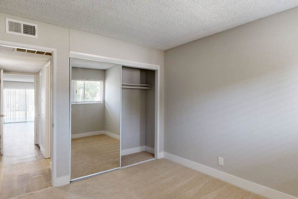 Double door bedroom closet and access to patio at The Indie Glendale Collection in Glendale, California