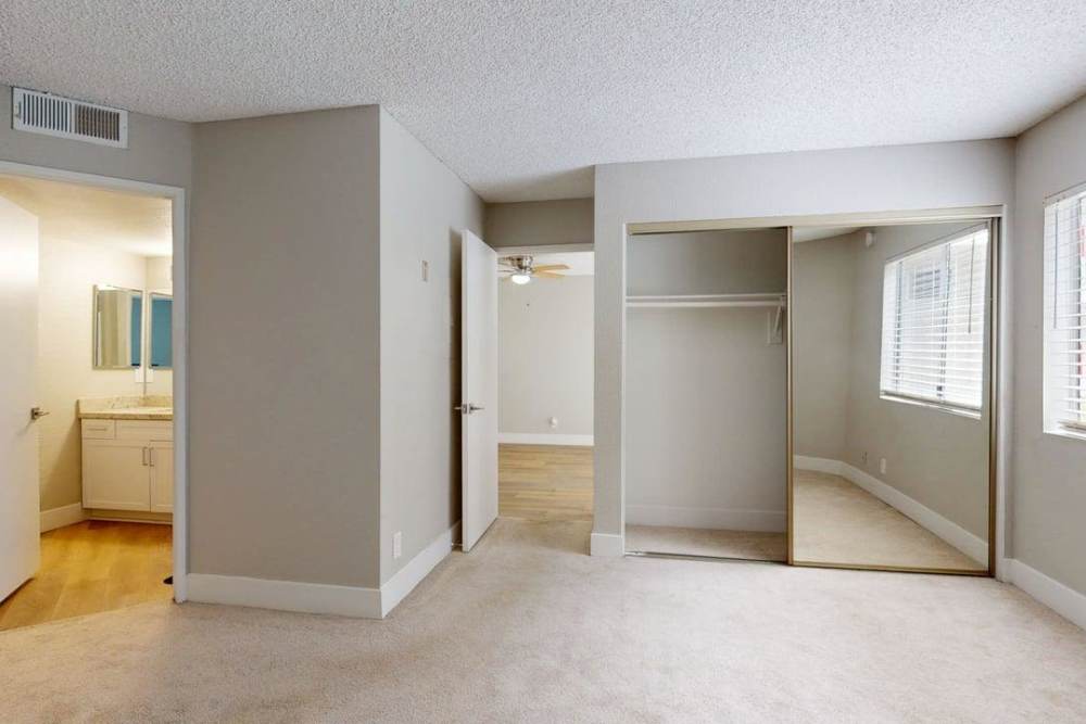 Empty room with walk-in closet with attached washroom at The Indie Glendale Collection in Glendale, California