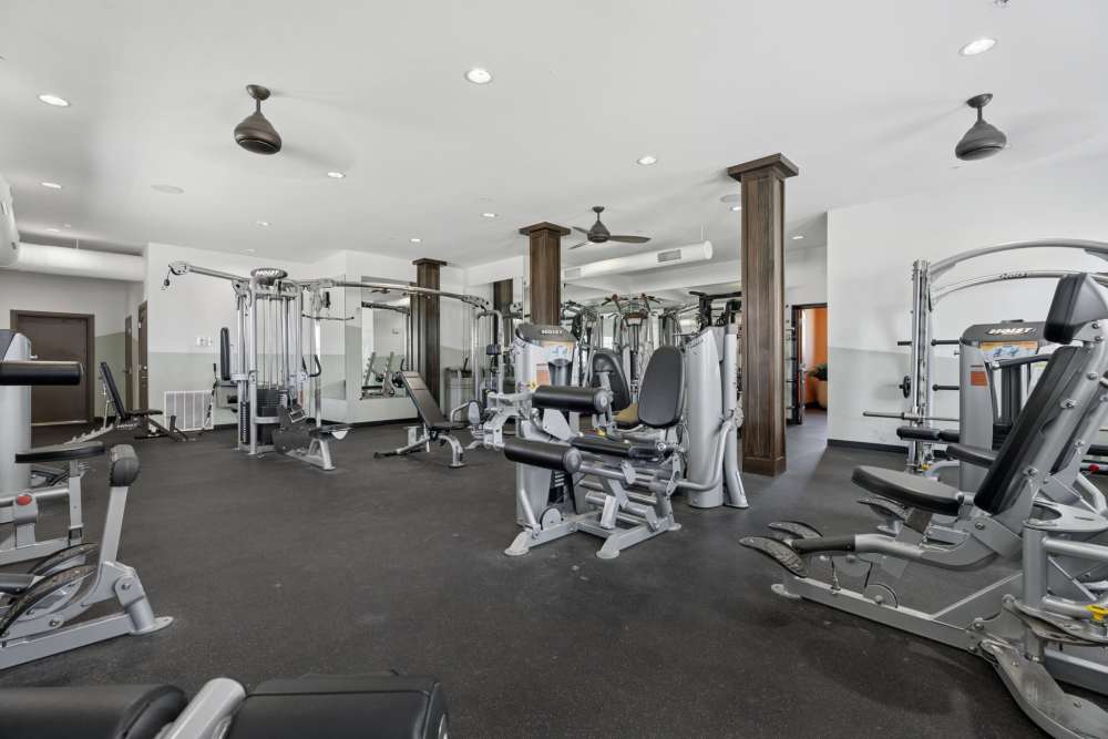 Fully-equipped fitness center at Cottage Row Stillwater in Stillwater, Oklahoma