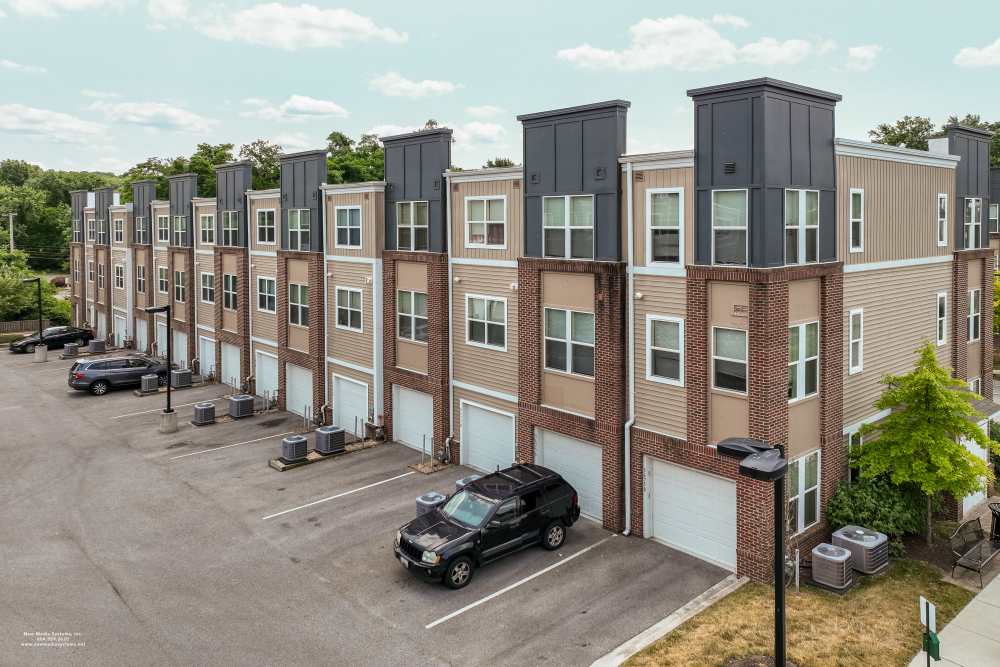Community building with outside parking area at RiverWatch Apartments in Elkridge, Maryland