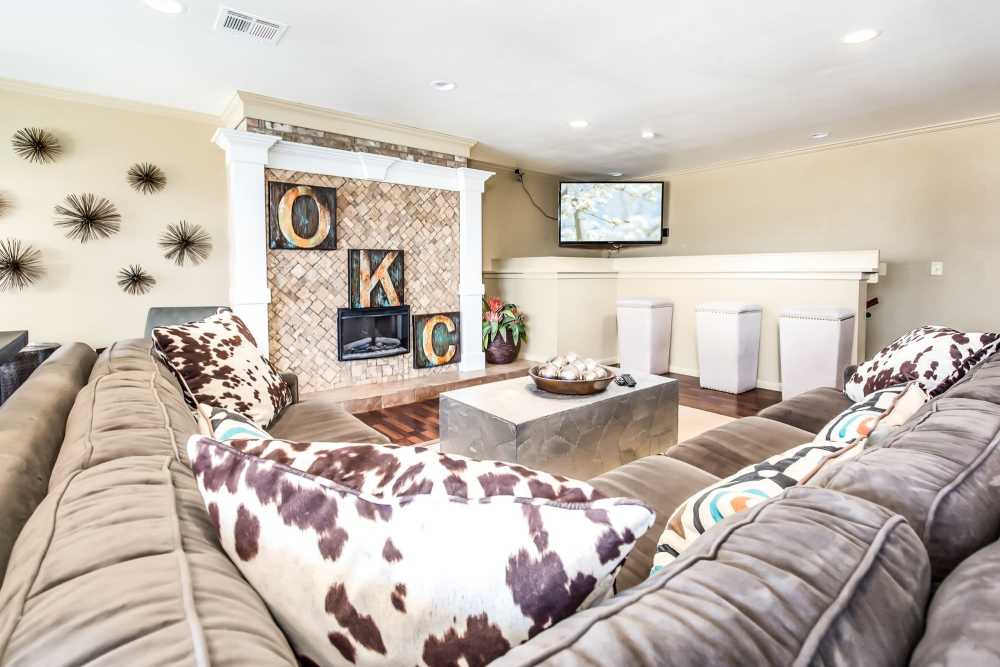 Clubhouse with large sofa at Council Crossing in Bethany, Oklahoma