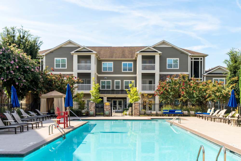 Spacious community swimming pool at Oasis at Montclair Apartments in Dumfries, Virginia