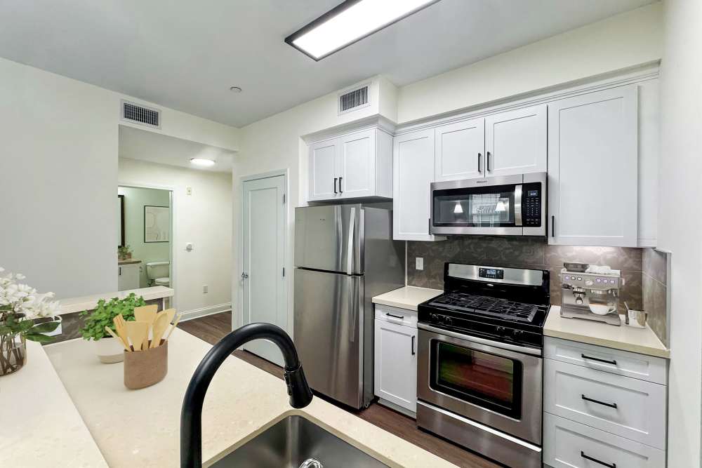 Well-equipped Renovated kitchen with modern and energy-efficient appliances at La Belle at Hollywood Tower in Los Angeles, California