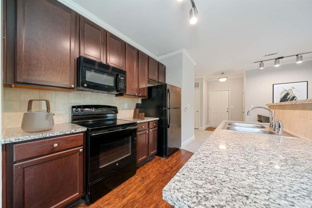 Asheville, NC Apartments - Retreat At Hunt Hill - Kitchen with wooden cabinets