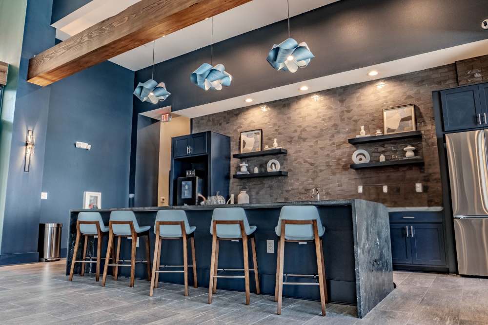 Residents in an apartment kitchen at The Waters at Promenade in Marrero, Louisiana