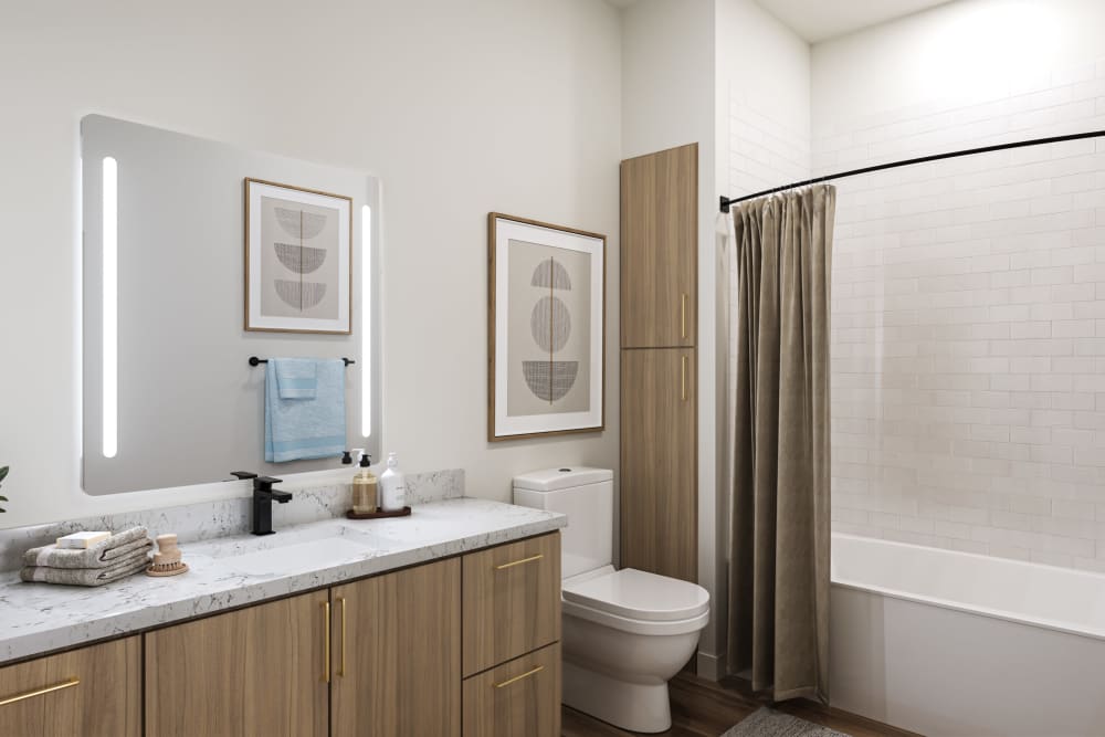 Modern bathroom with sleek cabinetry and stylish fixtures at Colony Parc in Ventura, California