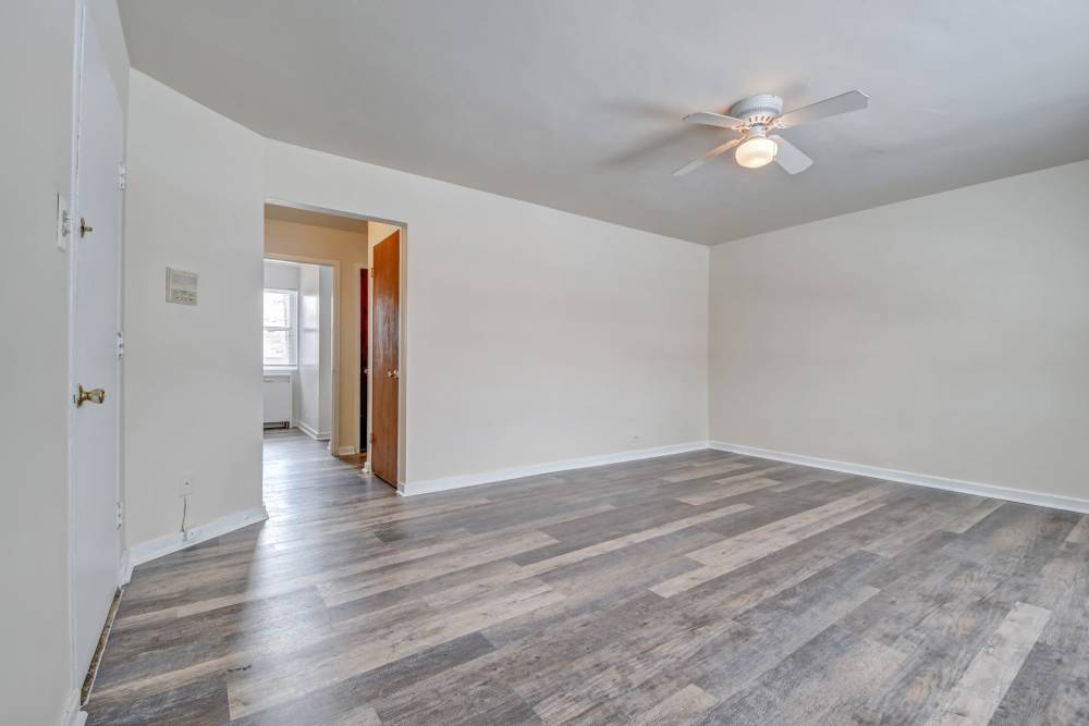 Modern kitchen with wooden cabinets at Chatham Grove Apartments in Chicago, Illinois, 
