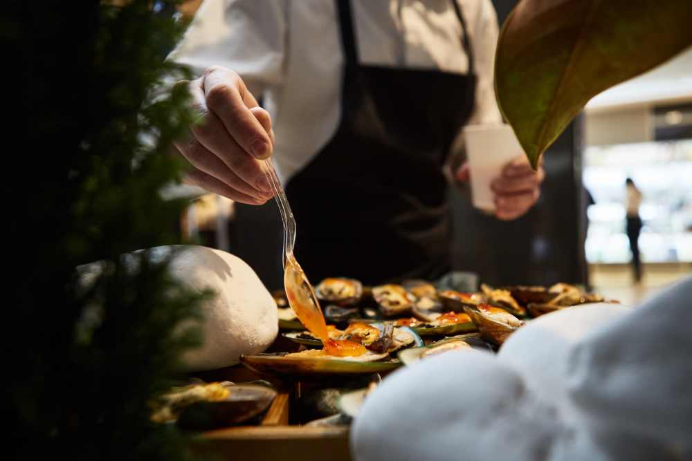 Chef preparing food near The Fields in Milpitas, California