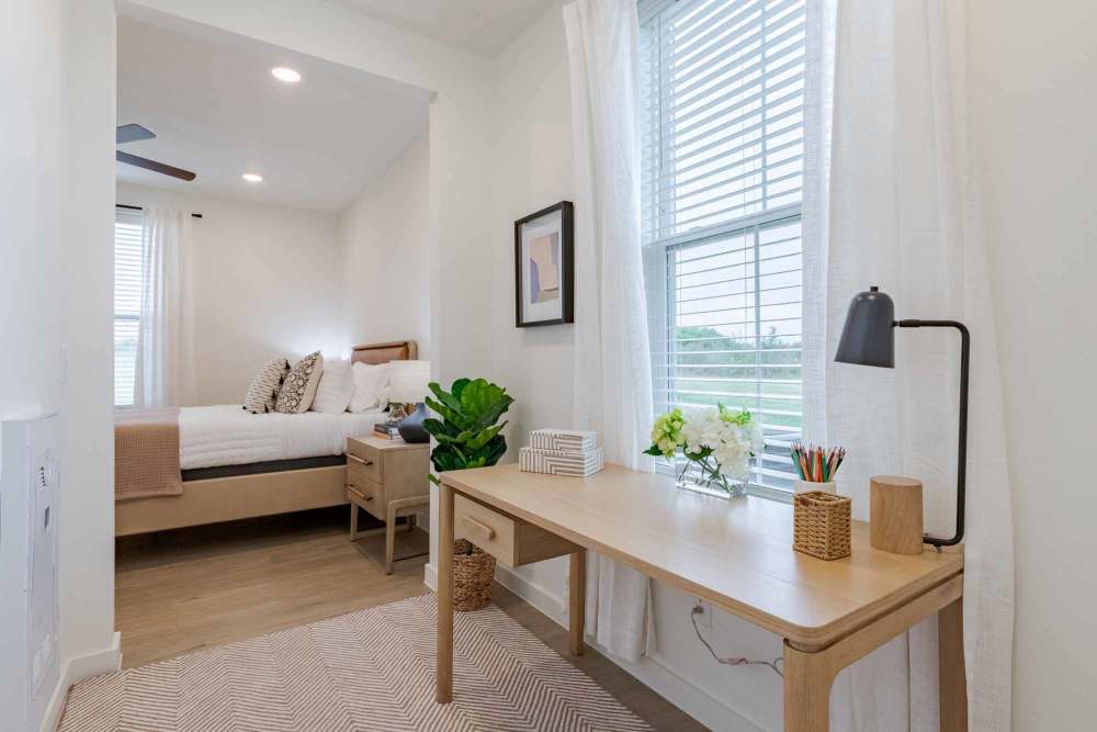 Large windows and modern bedrooms in The Ramsay in Springdale, Arkansas