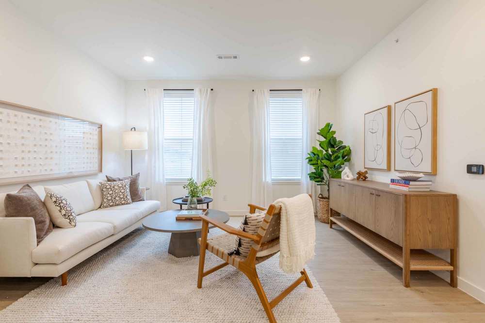 Living room and large windows in The Ramsay in Springdale, Arkansas