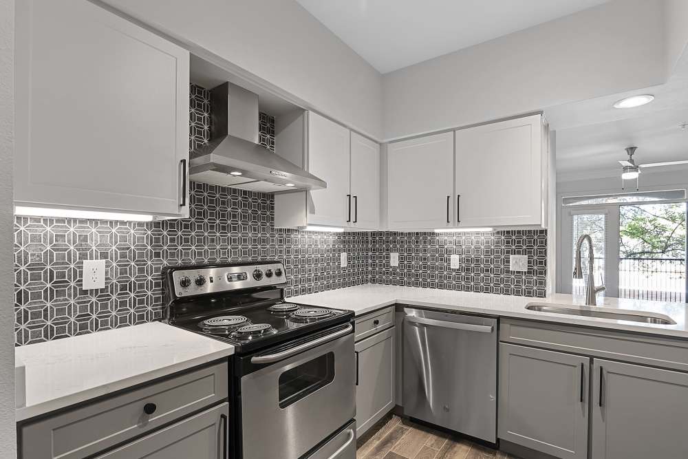 Kitchen with stainless-steel appliances at Kimpton in Houston,Texas