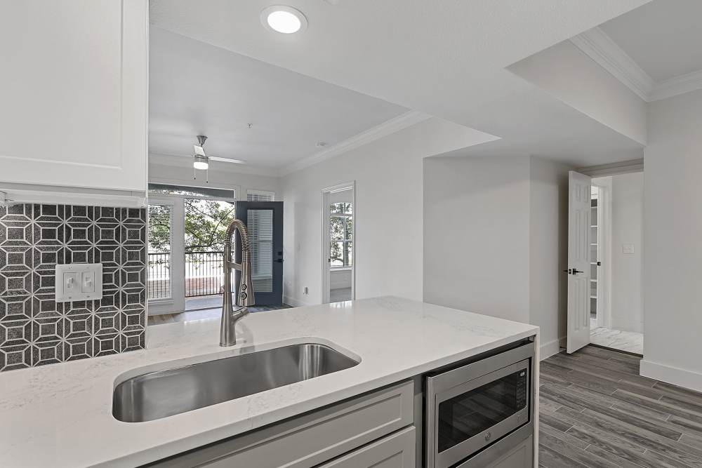 Kitchen with granite countertop at Kimpton in Houston,Texas