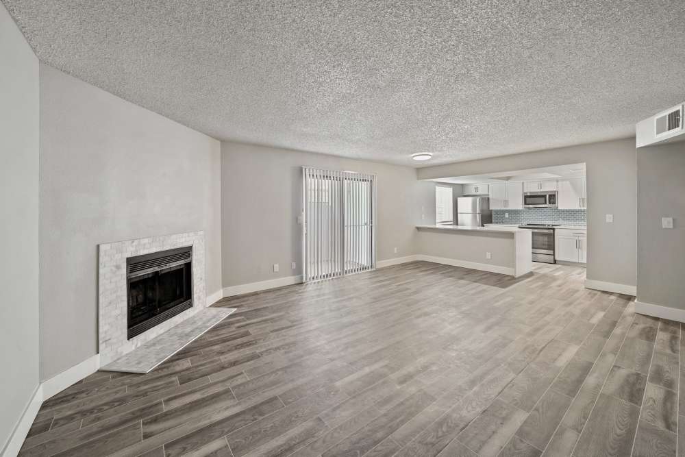 Unfurnished living room with fireplace at Cyprus in Phoenix, Arizona