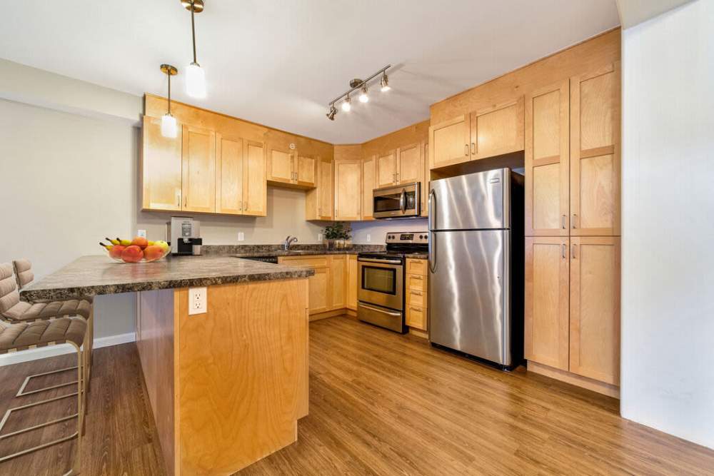 Open plan kitchen at The Residences at Lincoln Park in Dartmouth, Massachusetts