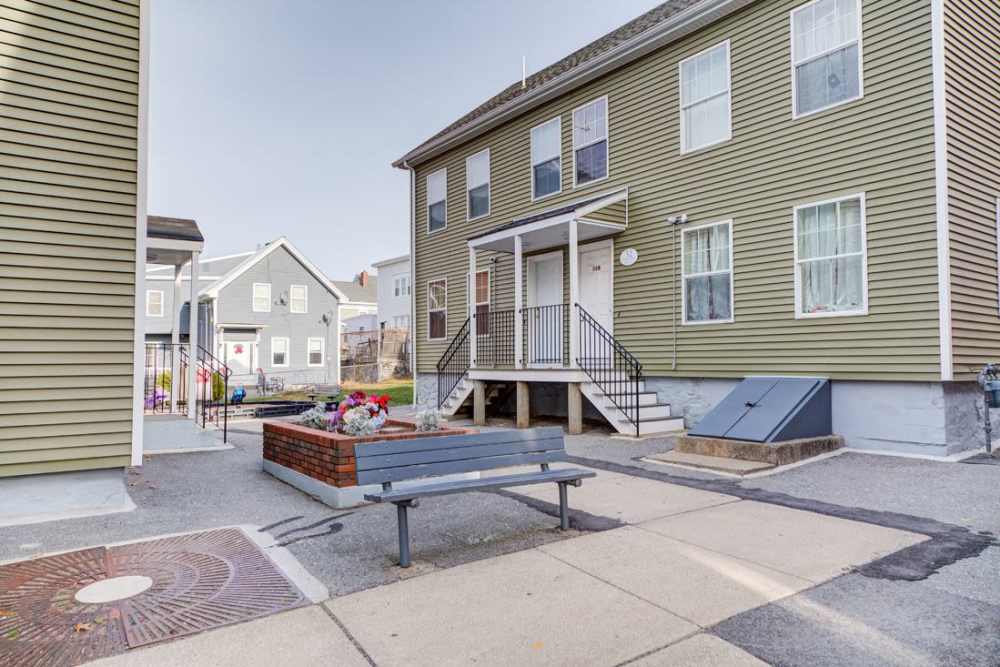 Exterior view of apartments at Lowell Belvidere Apartments in Lowell, Massachusetts