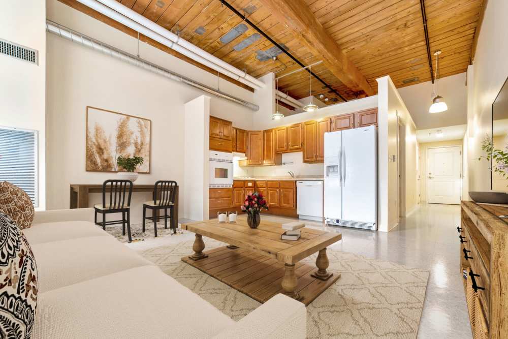 Kitchen with white appliances at Linwood Mill Apartments in Whitinsville, Massachusetts