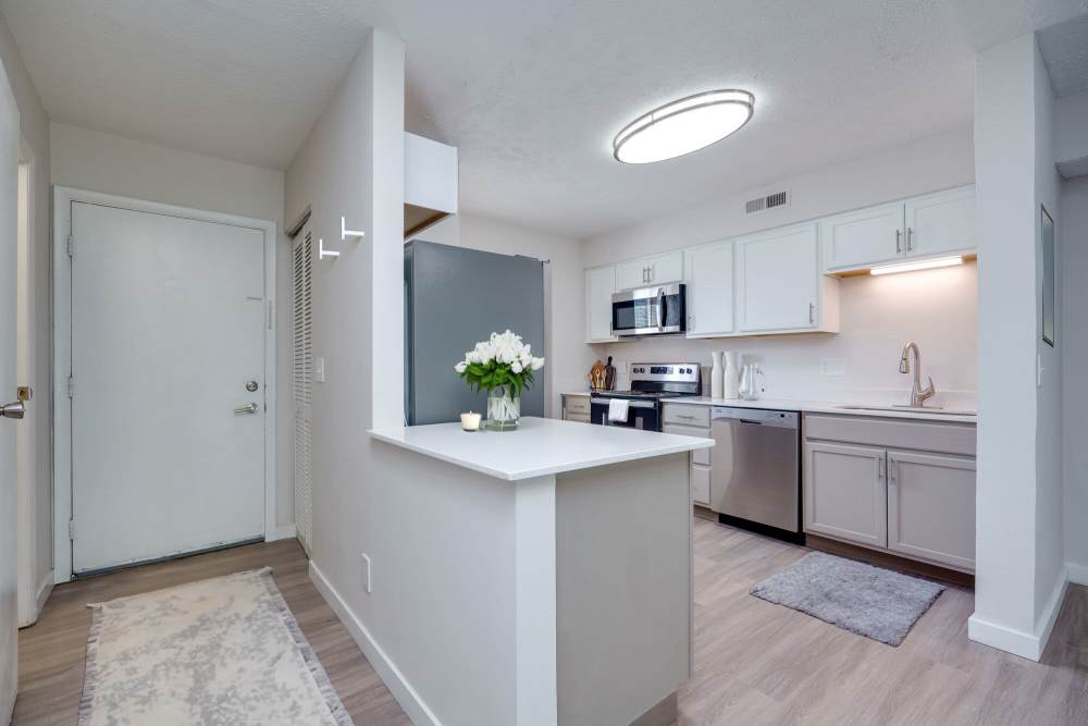 Kitchen with appliances at Maple Oaks in Middletown, Ohio