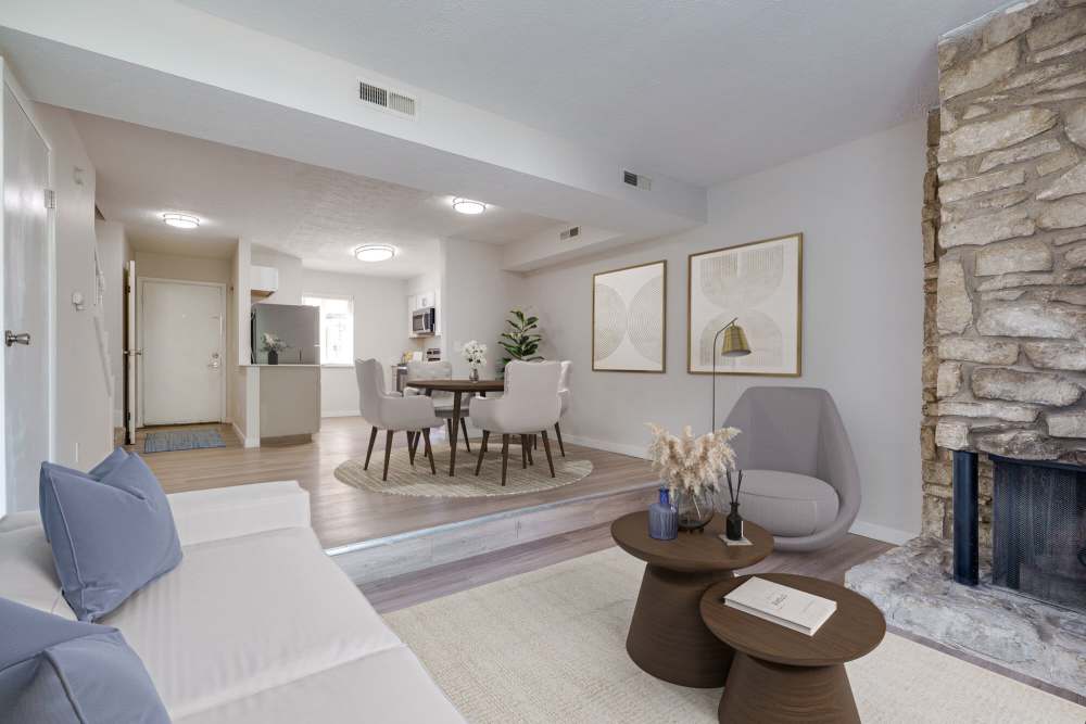 Living room with connecting dining space at Maple Oaks in Middletown, Ohio