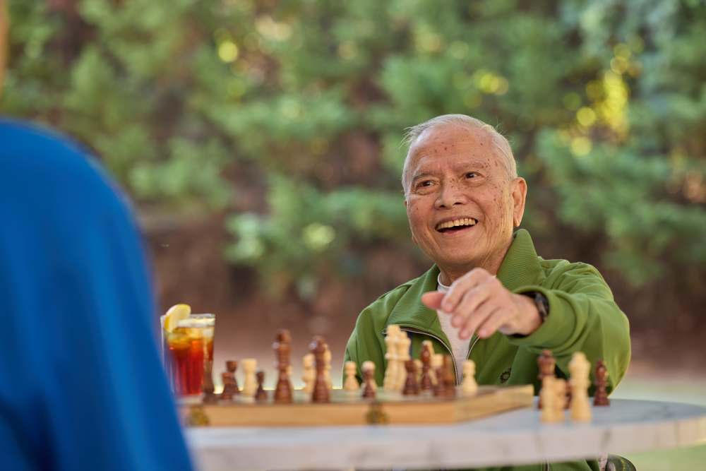 Residents playing chess at The Barclay at ParkSquare in Aventura, Florida