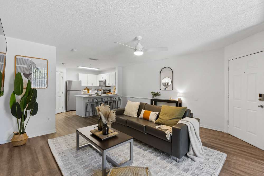 Renovated living room at The Quarters Gainesville in Gainesville, Florida