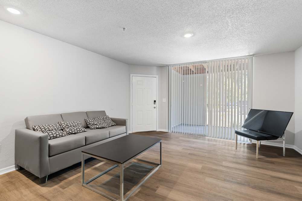 Renovated living room at The Quarters Gainesville in Gainesville, Florida