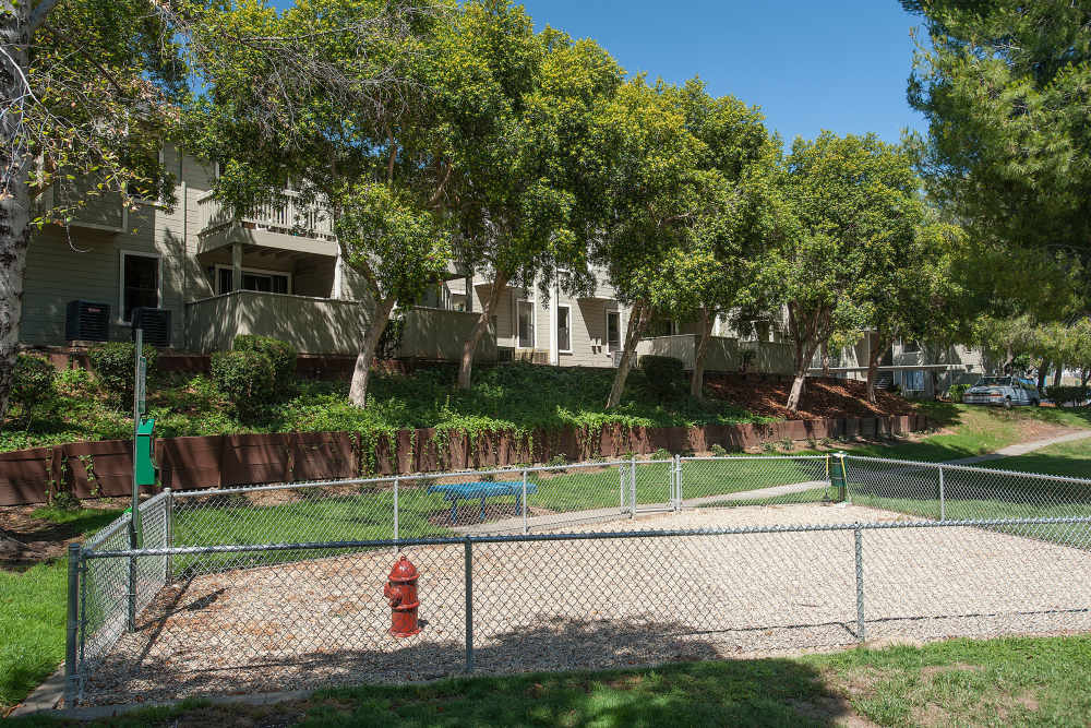 Fenced-in dog park at Sandpiper Village Apartment Homes in Vacaville,California