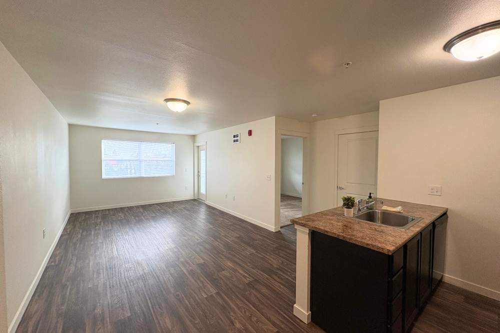 Kitchen and living room view at K West Apartments in Vancouver, Washington