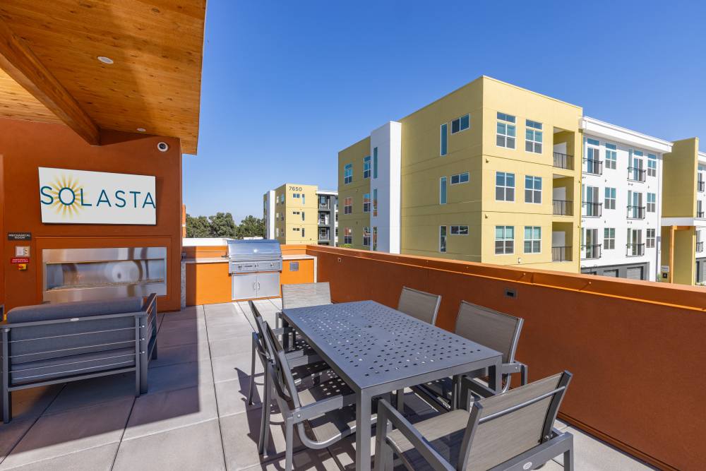 Deck with outdoor bbq and seating at Solasta in Sacramento, California