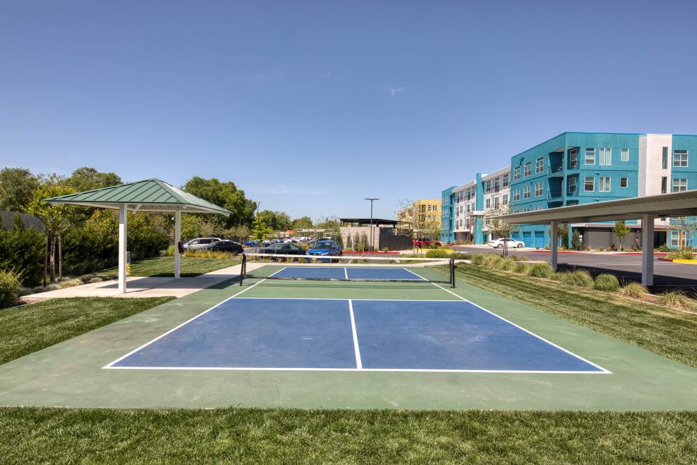 Tennis court with canopy at Solasta in Sacramento, California