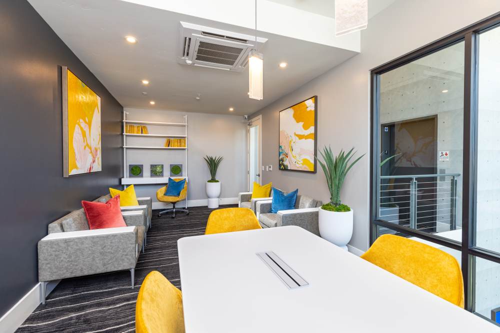 Conference room with couch and table at Solasta in Sacramento, California