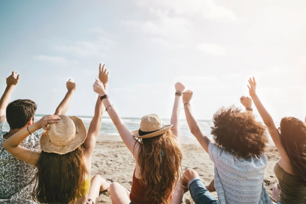 Happy people near the water at Viva Communities in New Smyrna Beach, FL