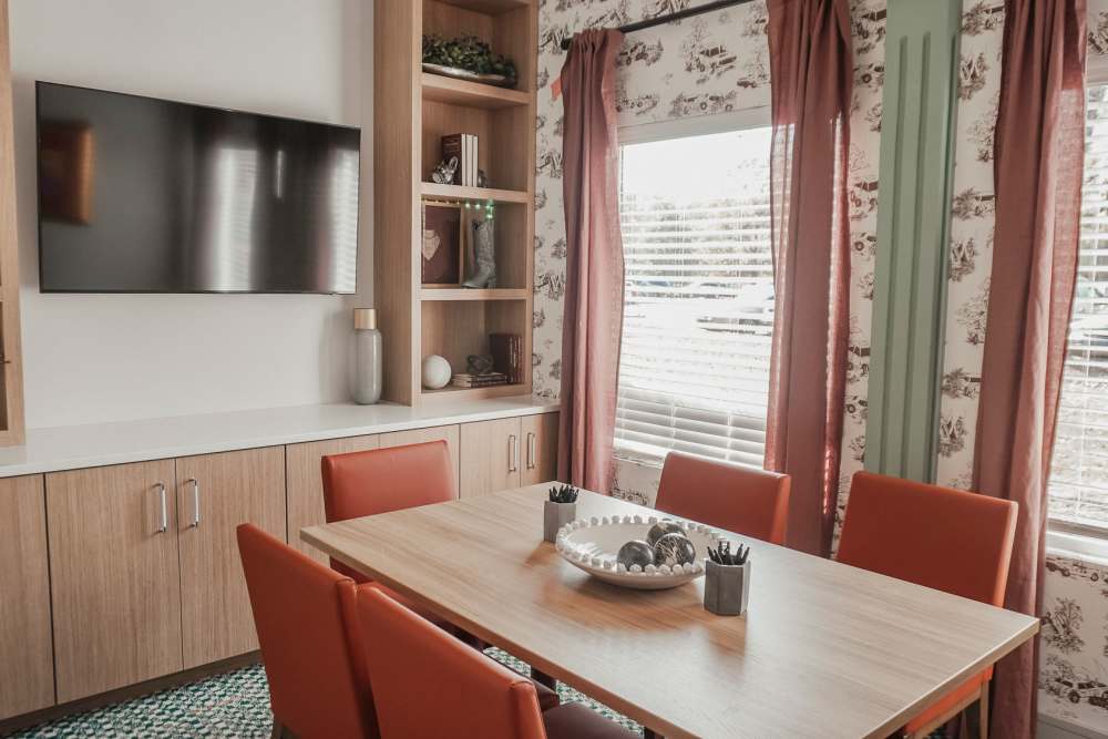 Resident lounge in the clubhouse at The Quarters Starkville in Starkville, Mississippi