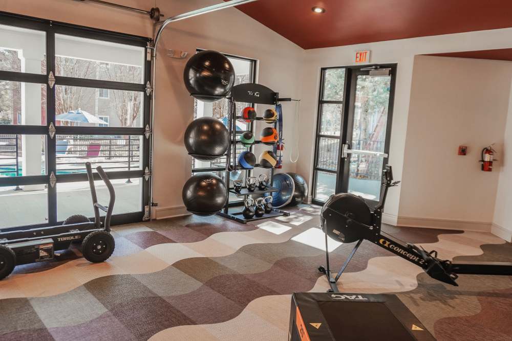 Well-Equipped Fitness Room With Exercise Equipment at The Quarters Starkville in Starkville, Mississippi