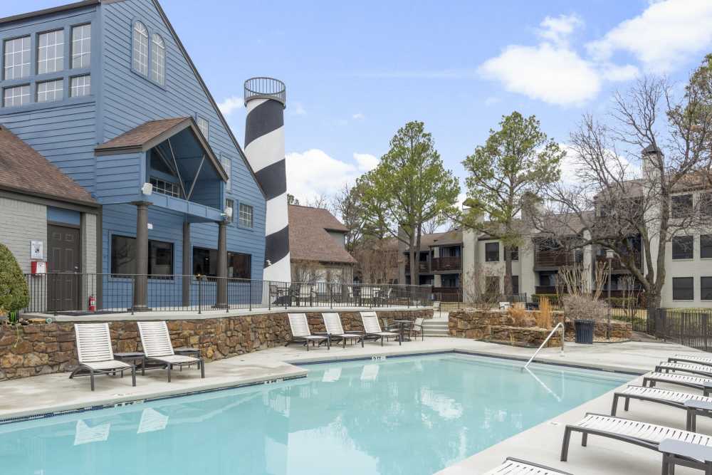 Resort style swimming pool with lounge seating at Waterside in Tulsa, Oklahoma
